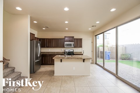 a kitchen with stainless steel appliances and a granite counter top