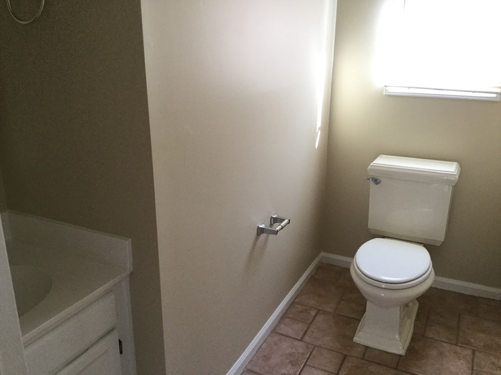a small bathroom with a toilet and a sink