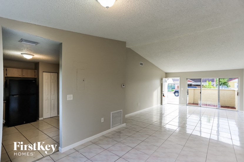 the living room and dining room are spacious with tile flooring