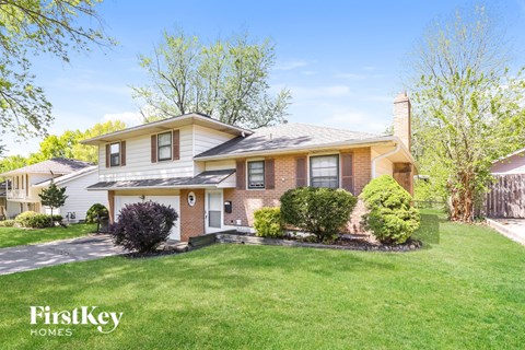a home with a yard and a lawn