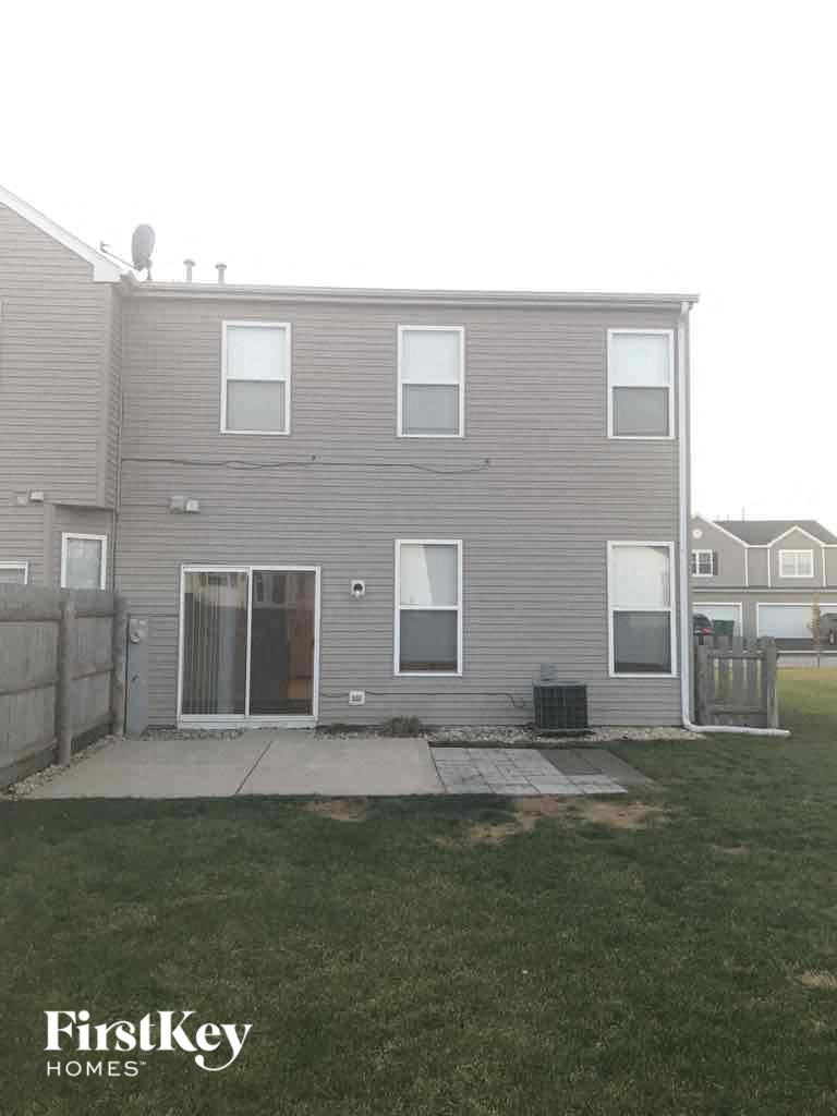 a house with a yard in front of it