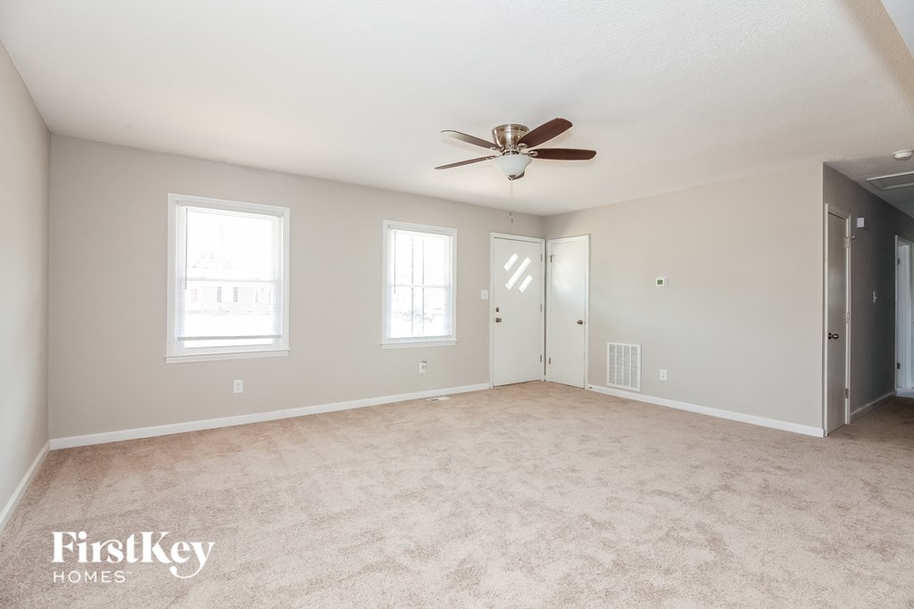 the living room is clean and ready for us to move in