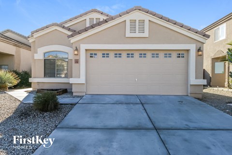 a new home with a garage door in front of it