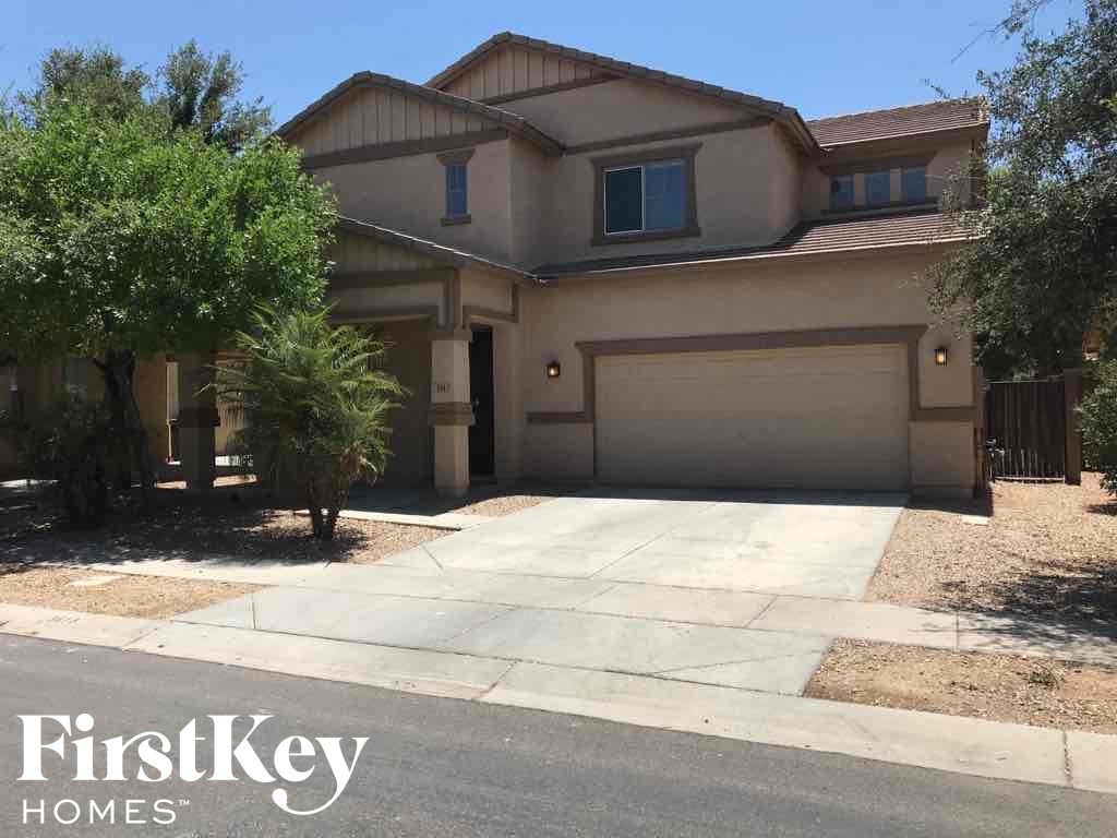 A house with a garage is for sale by FirstKey Homes.