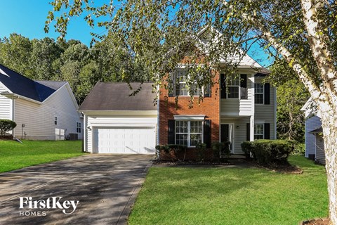 A house with a garage is shown in the image.