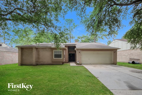 A house with a garage is for sale by FirstKey Homes.