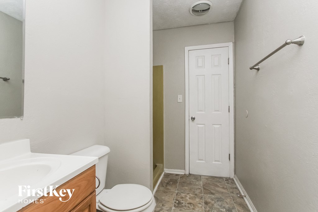 the bathroom is clean and ready to be remodeled