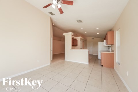 a view of the kitchen and dining room from the living room