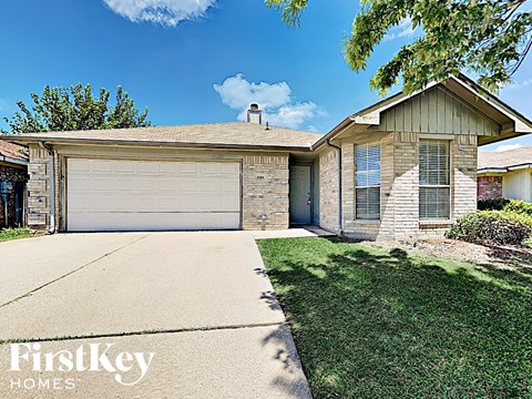A house with a garage door that says FirstKey Homes.