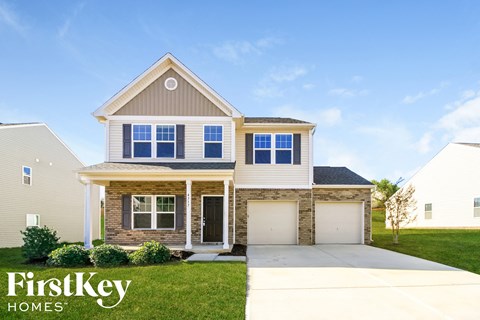A house with a garage and a driveway is shown with the words "FirstKey Homes" on the bottom.