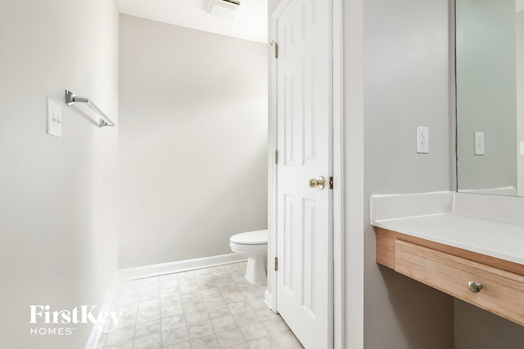 a small bathroom with a toilet and a sink
