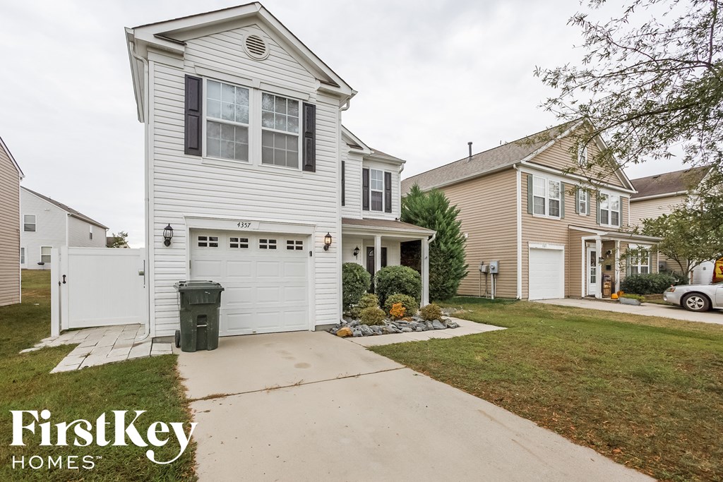 A white house with a garage is shown with the words "FirstKey Homes" on the bottom.