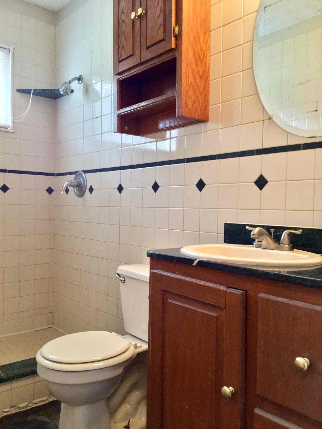 a bathroom with a toilet and a sink