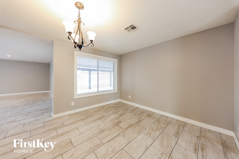 the living room and dining room are spacious and ready for guests to use