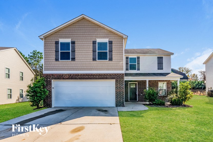 A house with a garage is shown in the image.
