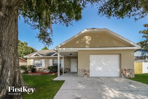 A house with a garage is for sale by FirstKey Homes.