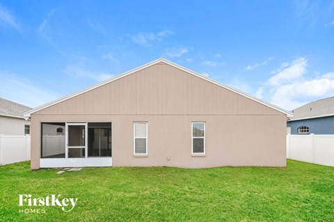 the exterior of a house with a grassy yard