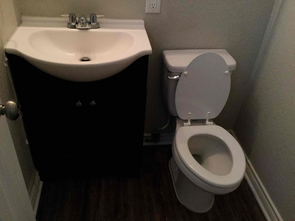 a small bathroom with a toilet and a sink
