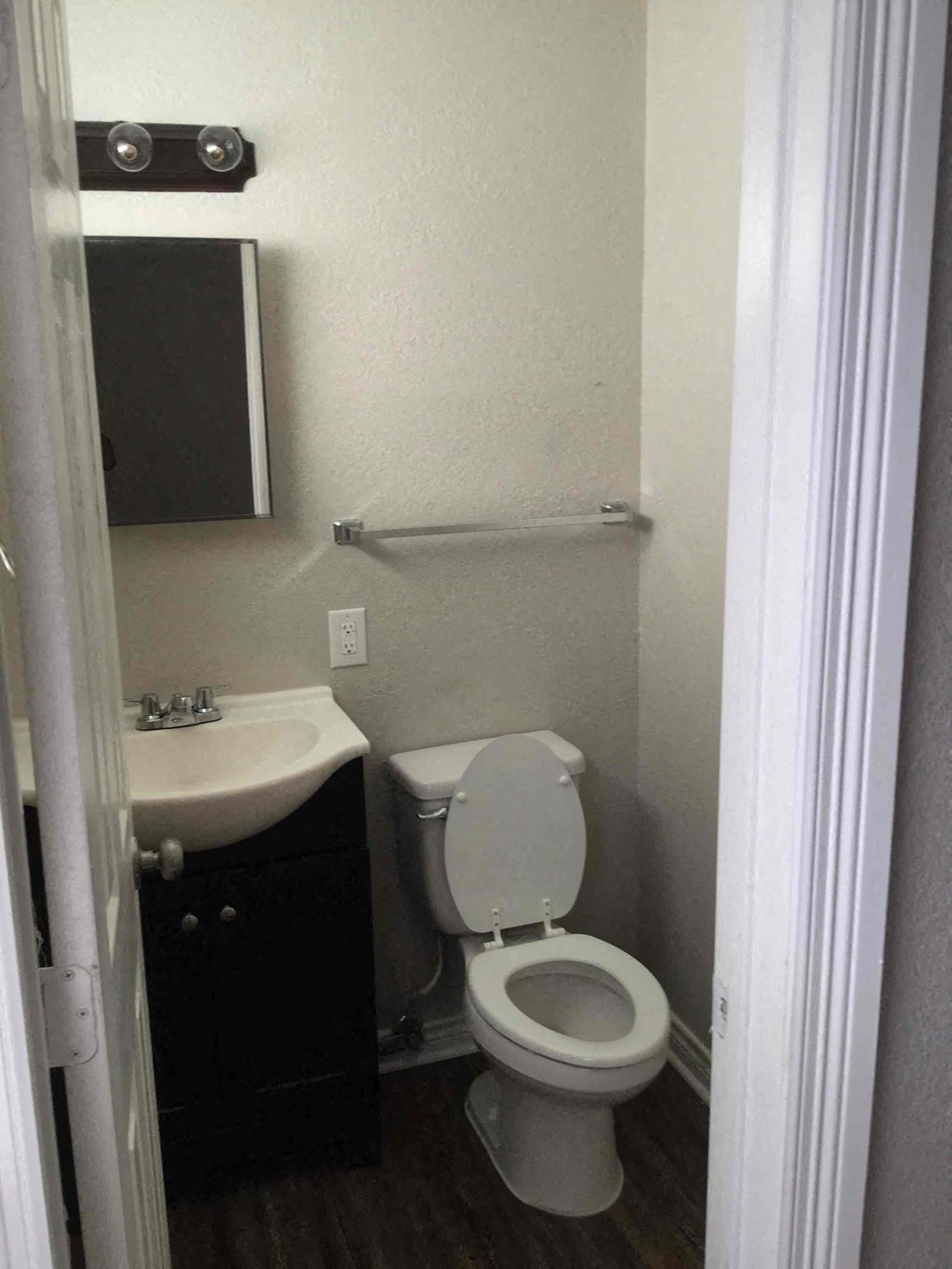 a small bathroom with a toilet and a sink