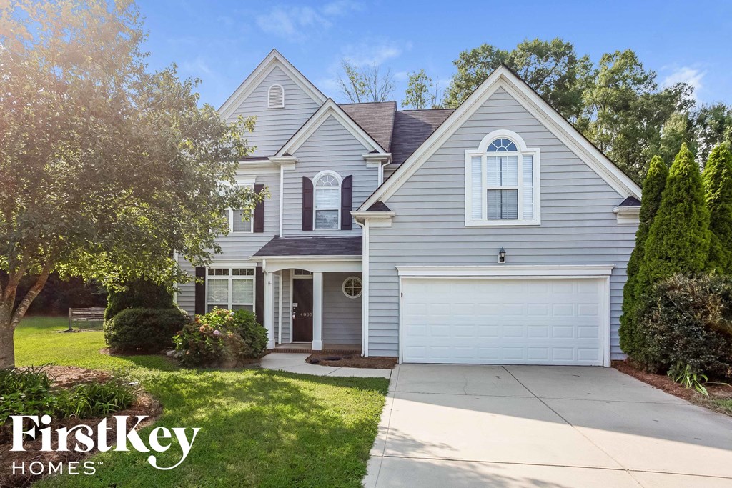 A house with a garage is for sale by FirstKey Homes.