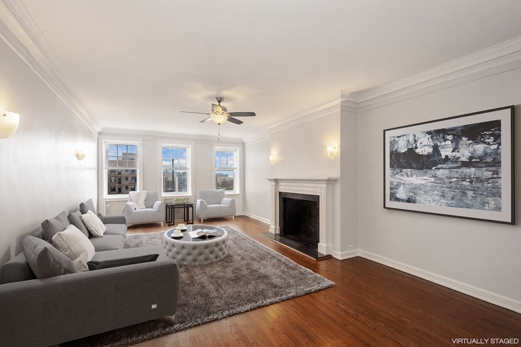 a living room with a couch and a fire place
