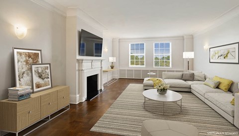 a living room with a couch and a table