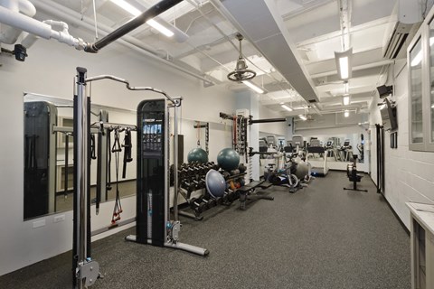 the gym at the flats at big tex apartments