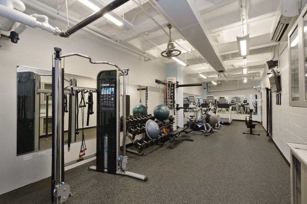 the gym at the flats at big tex apartments