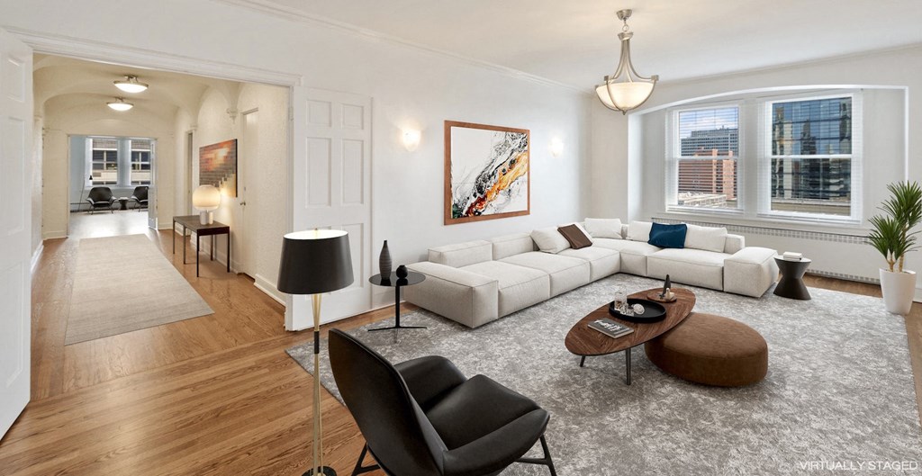 a living room with a couch and a table