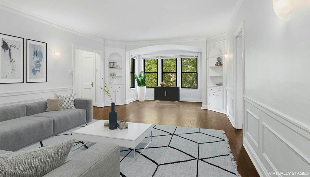 a living room with a couch and a table