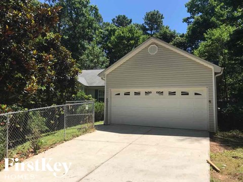 A two-car garage is situated in a residential area.