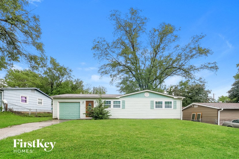 A house with a garage is for sale by FirstKey Homes.