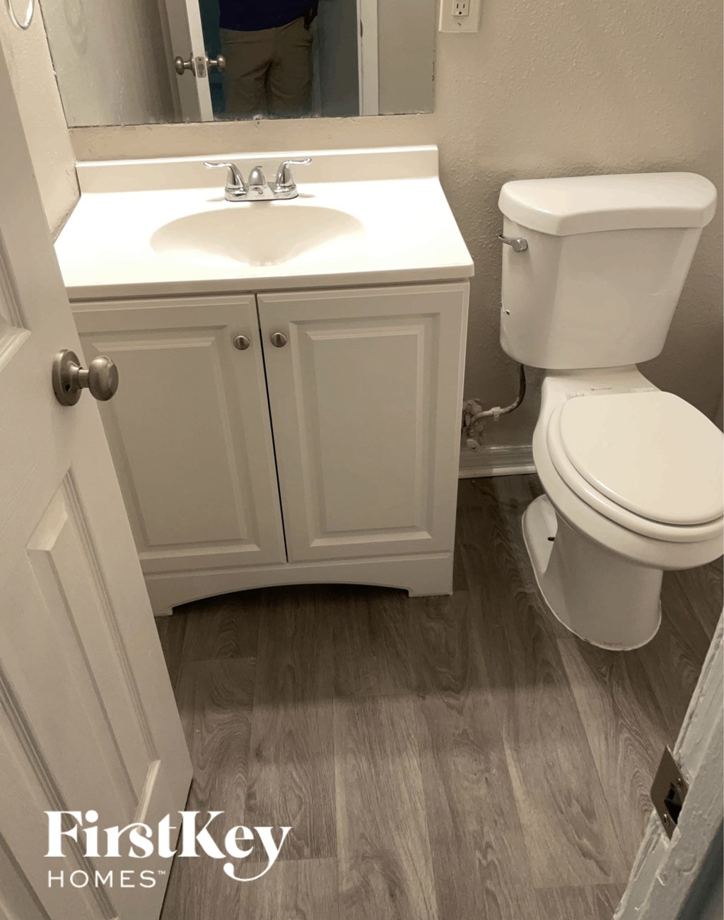 a small bathroom with a toilet and a sink