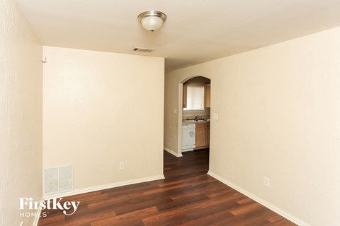 A room with a washer and dryer in it.