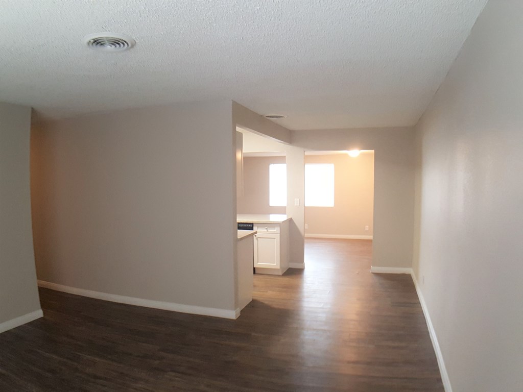 A room with a white ceiling and a white cabinet.