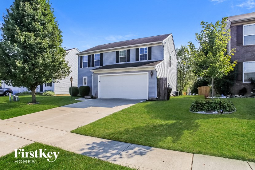 A house with a garage is for sale by FirstKey Homes.