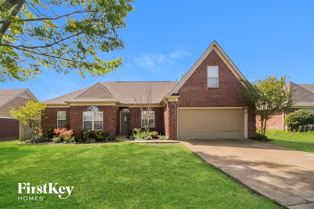 A house with a garage is for sale by FirstKey Homes.