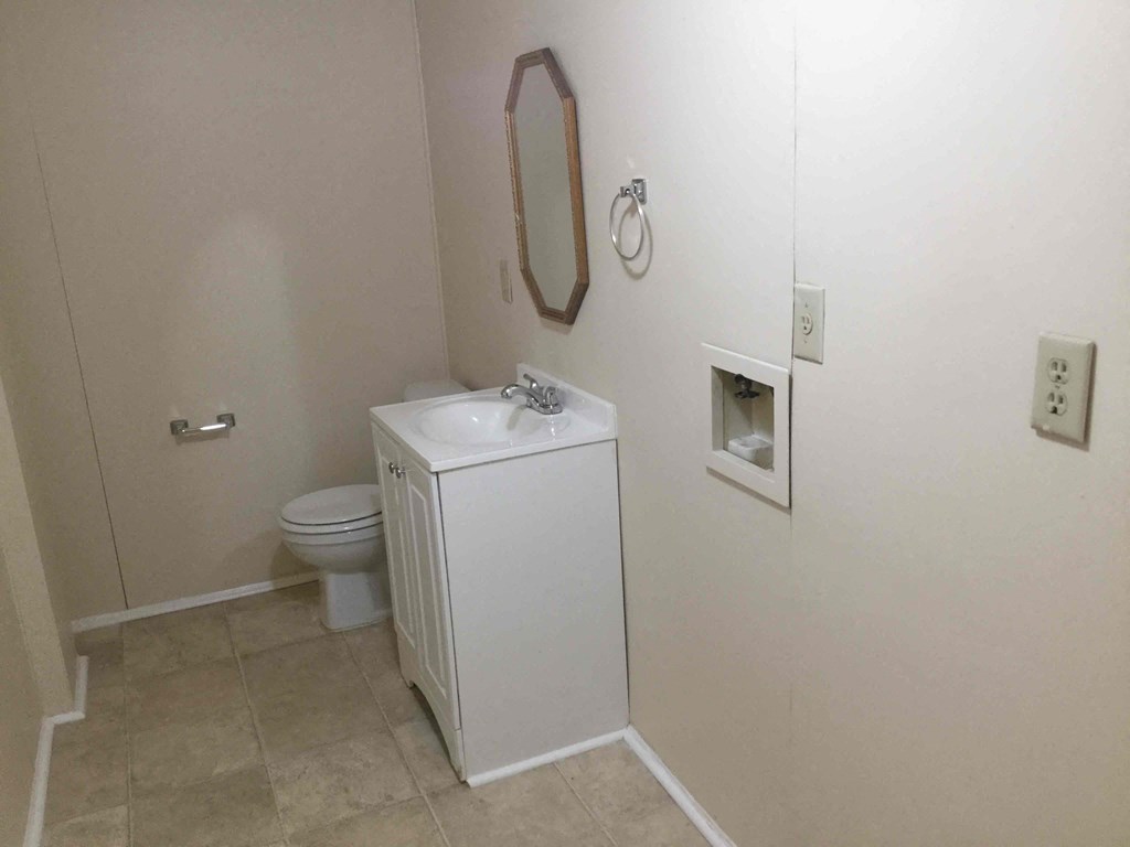 a small bathroom with a toilet and a sink