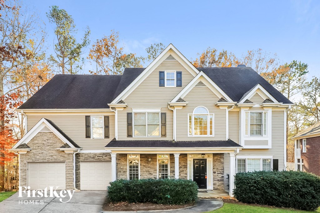 full view of house with trees in the background