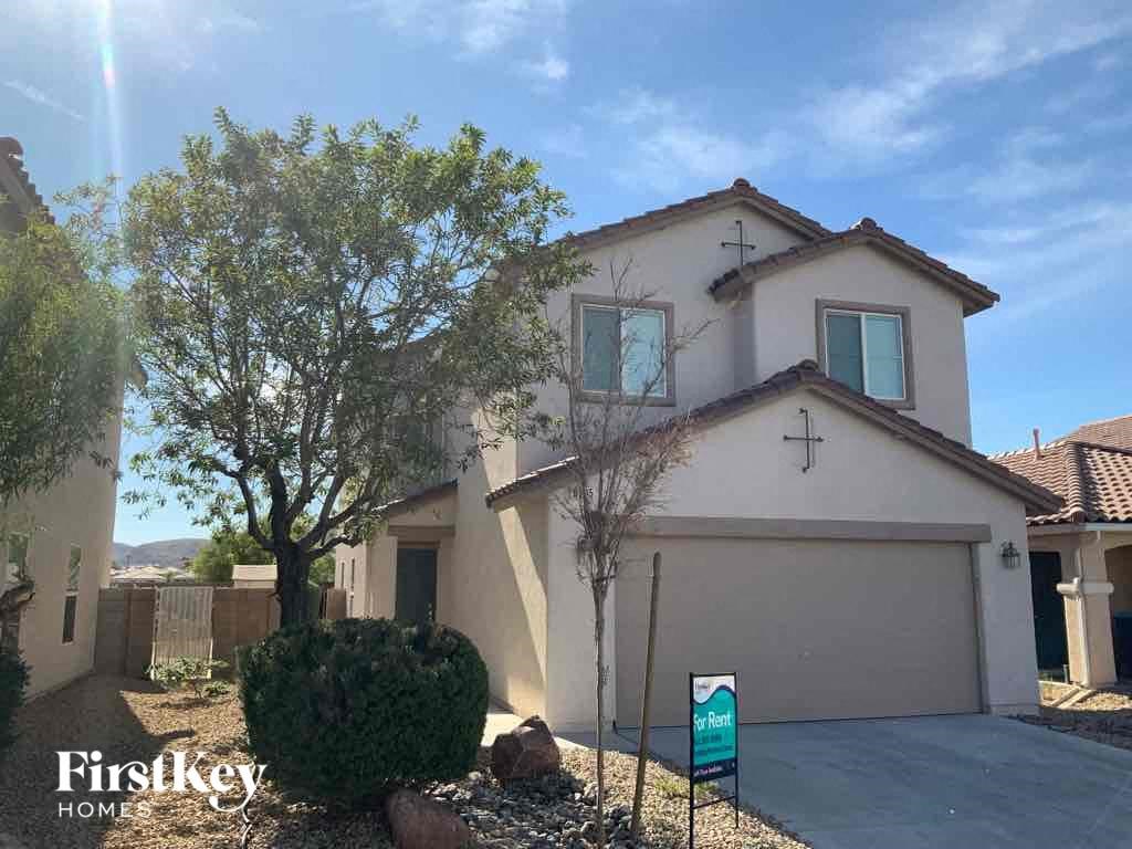 A house with a sign that says "Firstkey Homes" in front of it.