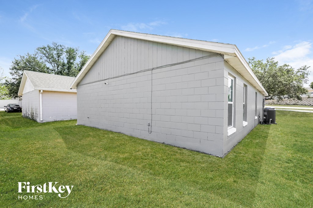 A white building with a FirstKey Homes logo.