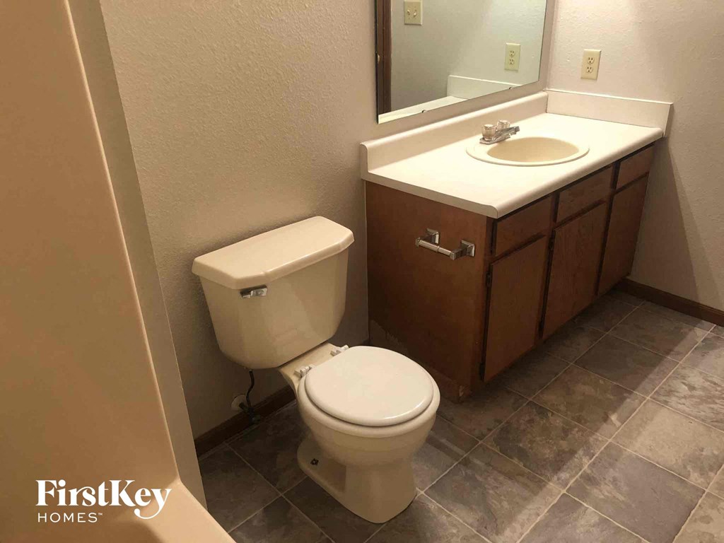 a small bathroom with a toilet and a sink