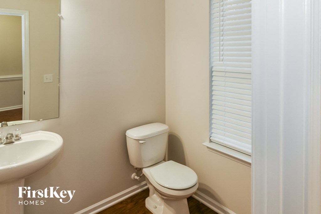 a small bathroom with a toilet and a sink