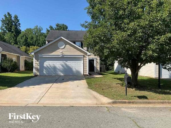 A house with a garage is for sale by FirstKey Homes.