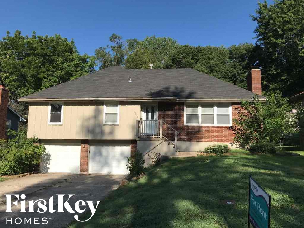 A house with a sign that says FirstKey Homes.