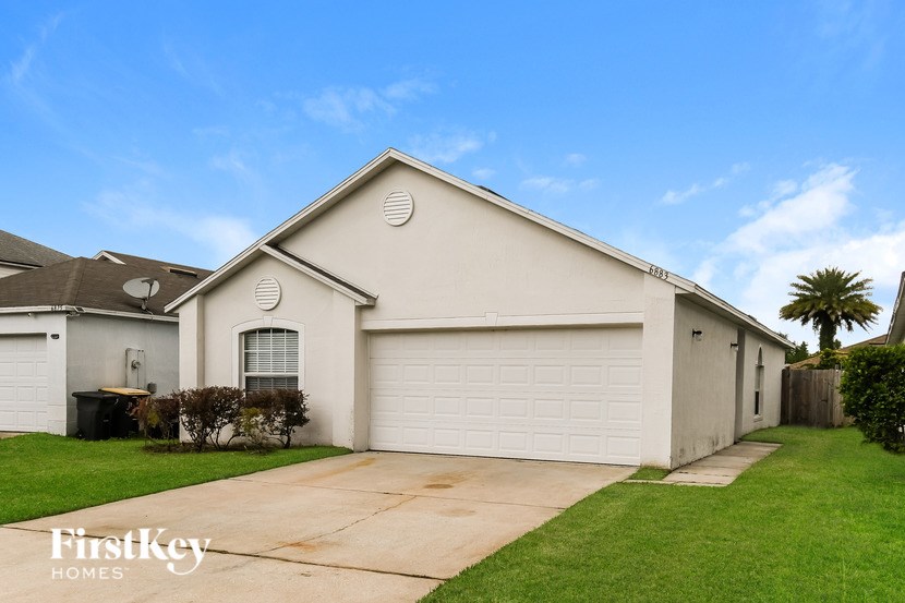 A two-car garage is attached to a house.