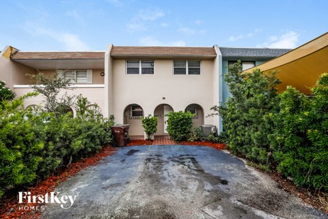 a house with a driveway in front of it