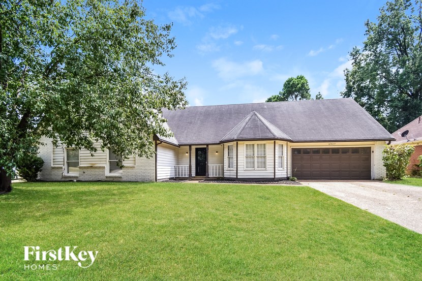 A house with a garage is for sale by FirstKey Homes.