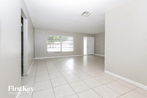 the living room and dining room are spacious and clean