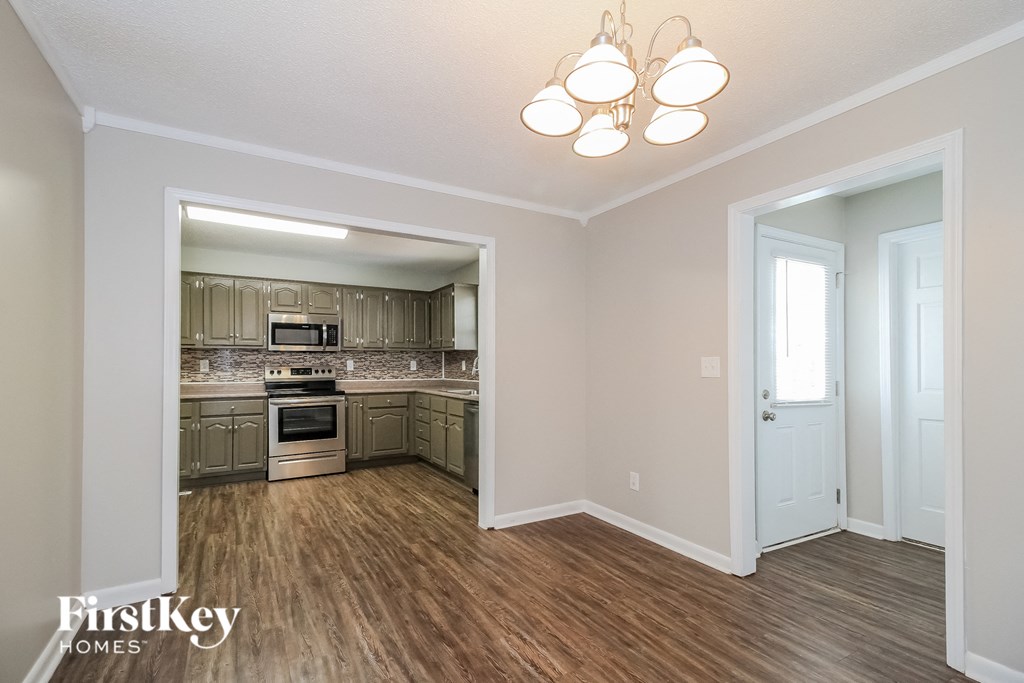 the kitchen and living room of an open floor plan